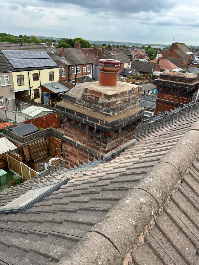 This is a photo taken from a roof which is being repaired by Retford Roofing Repairs, it shows a street of houses, and their roofs